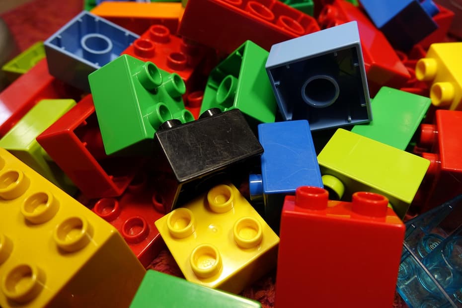Close-up shot of colorful pile of large plastic building blocks.