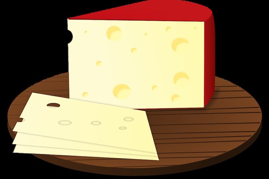 A wedge and slices of Swiss cheese full of holes on a wooden board.